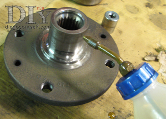 Remontage du porte-fusée : repose du moyeu