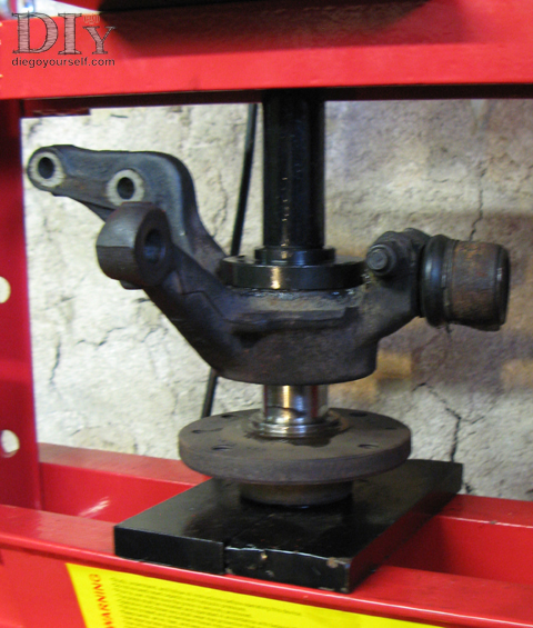 Remontage du porte-fusée : repose du moyeu