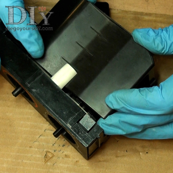 Reposez le couvercle de protection