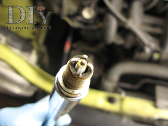 Dépose d'une bougie