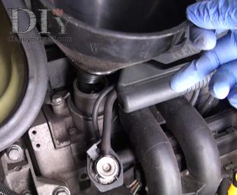 Remplir avec la nouvelle huile